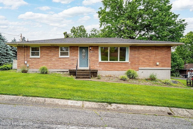 609 Lynn Rd, New Albany, IN 47150 - view of front of property with entry steps, brick siding, and a front lawn