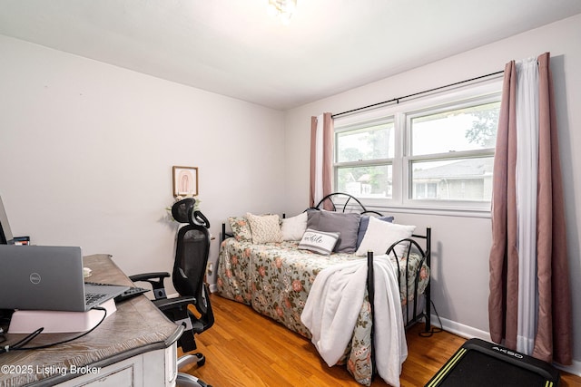609 Lynn Rd, New Albany, IN 47150 - bedroom featuring an office area and light wood finished floors