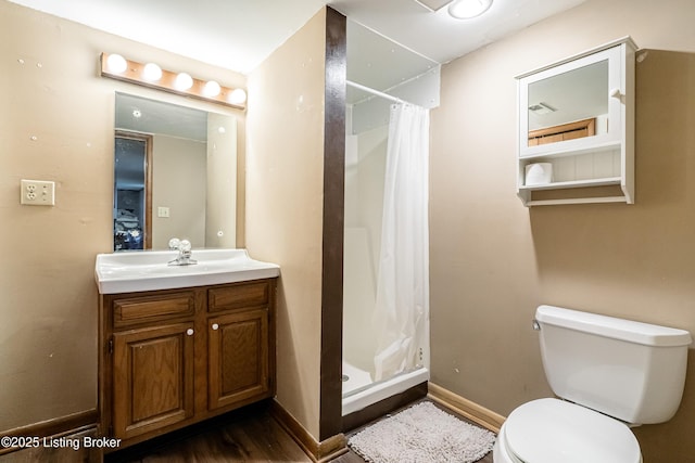 609 Lynn Rd, New Albany, IN 47150 - full bathroom with vanity, a shower stall, and wood finished floors