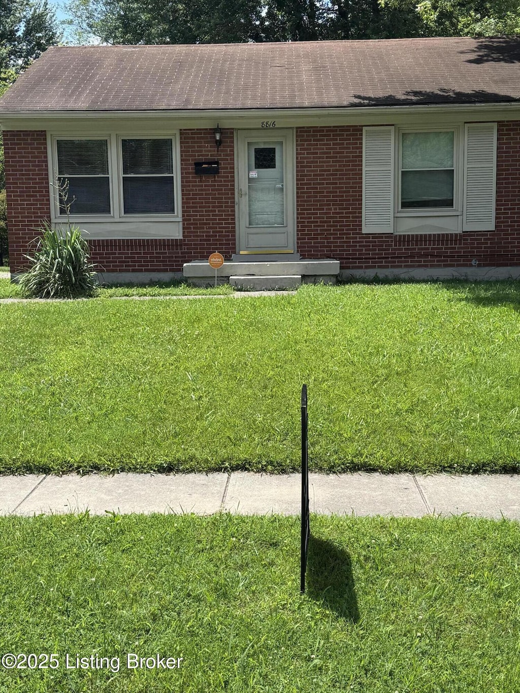 8816 Moody Rd, Louisville, KY 40219 - single story home featuring brick siding and a front lawn