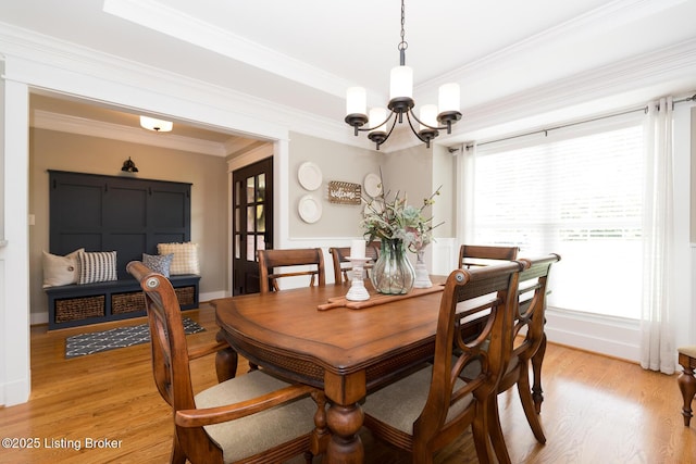 3511 Hardwood Forest Dr, Louisville, KY 40214 - dining room with a chandelier, light wood-style flooring, and crown molding