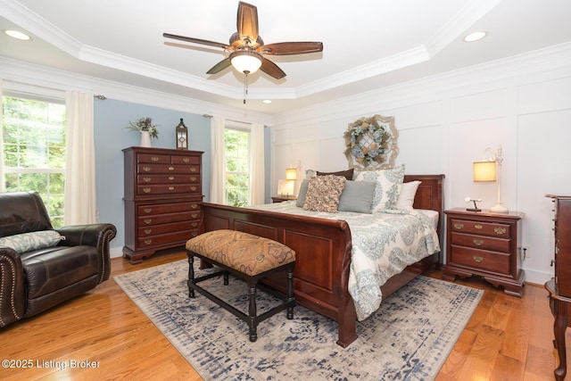 3511 Hardwood Forest Dr, Louisville, KY 40214 - bedroom featuring light wood-style floors, crown molding, a raised ceiling, a ceiling fan, and recessed lighting