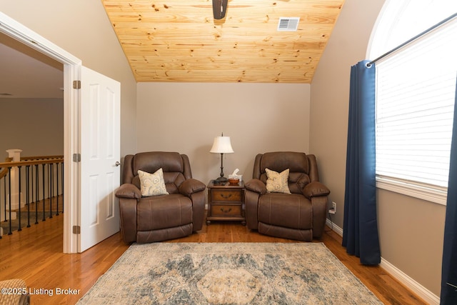 3511 Hardwood Forest Dr, Louisville, KY 40214 - living area with vaulted ceiling, wood finished floors, plenty of natural light, and an upstairs landing