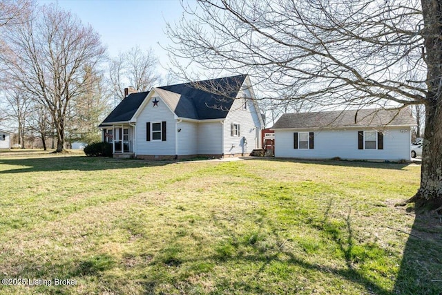 570 Sulphur Rd, Smiths Grove, KY 42171 - rear view of house featuring a chimney and a yard