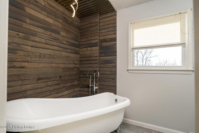 570 Sulphur Rd, Smiths Grove, KY 42171 - full bathroom featuring a soaking tub and baseboards
