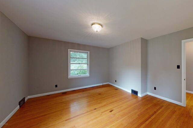 9212 Preston Hwy, Louisville, KY 40229 - spare room featuring light wood-style floors and baseboards