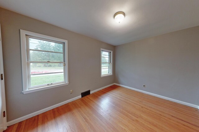 9212 Preston Hwy, Louisville, KY 40229 - unfurnished room with light wood-type flooring and baseboards