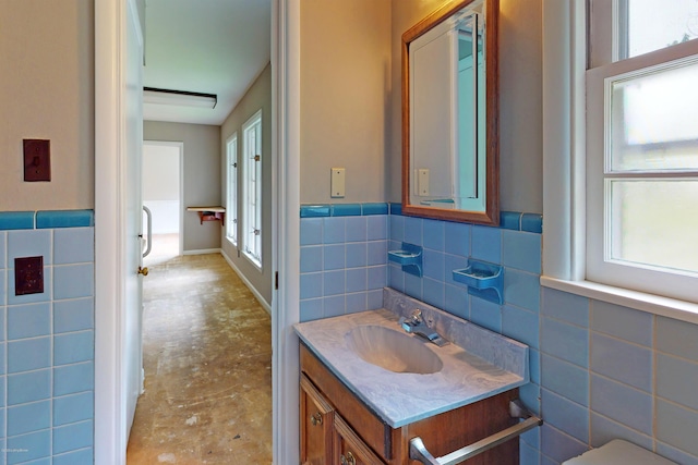 9212 Preston Hwy, Louisville, KY 40229 - half bath with tile walls, vanity, and wainscoting