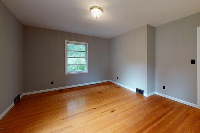 9212 Preston Hwy, Louisville, KY 40229 - empty room featuring light wood-style flooring
