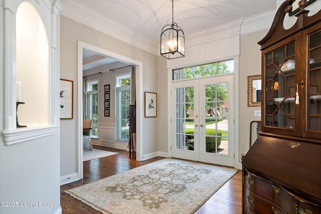 12812 Ridgemoor Dr, Prospect, KY 40059 - doorway with french doors, a chandelier, ornamental molding, and dark wood-style floors