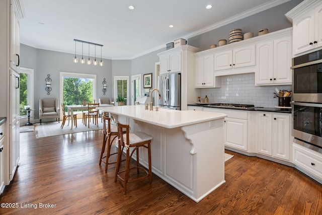 12812 Ridgemoor Dr, Prospect, KY 40059 - kitchen featuring stainless steel appliances, backsplash, white cabinets, dark wood-style flooring, and recessed lighting