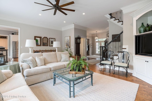 12812 Ridgemoor Dr, Prospect, KY 40059 - living room with stairs, ornamental molding, a ceiling fan, wood finished floors, and recessed lighting