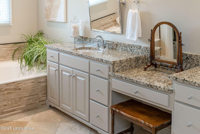 12812 Ridgemoor Dr, Prospect, KY 40059 - bathroom with vanity, tiled tub, and tile patterned flooring