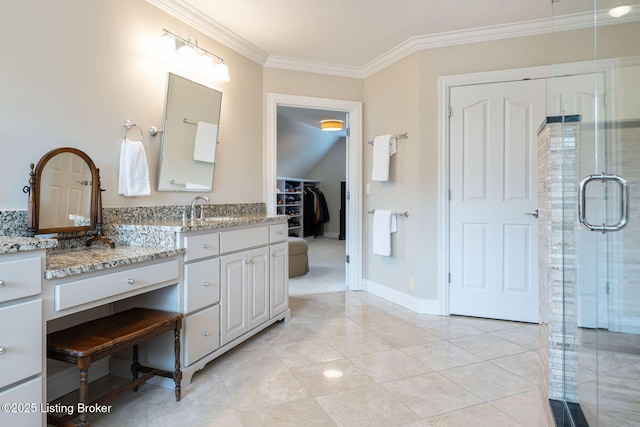 12812 Ridgemoor Dr, Prospect, KY 40059 - bathroom featuring ornamental molding, vanity, a shower stall, a walk in closet, and tile patterned floors