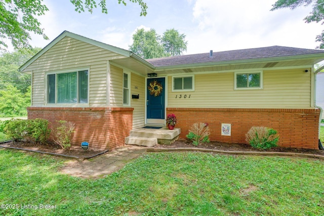 1301 Mark Trail Rd, Louisville, KY 40242 - view of front of property with brick siding and a front lawn
