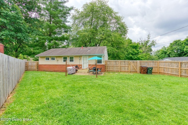 1301 Mark Trail Rd, Louisville, KY 40242 - rear view of house with a patio, a fenced backyard, and brick siding