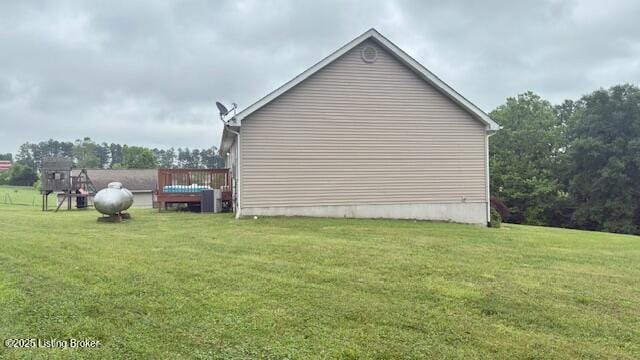 360 Grant Ridge Rd, Leitchfield, KY 42754 - view of property exterior featuring a yard and a deck