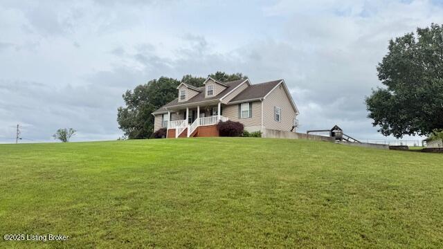 360 Grant Ridge Rd, Leitchfield, KY 42754 - cape cod home with a porch, a front yard, and stairway