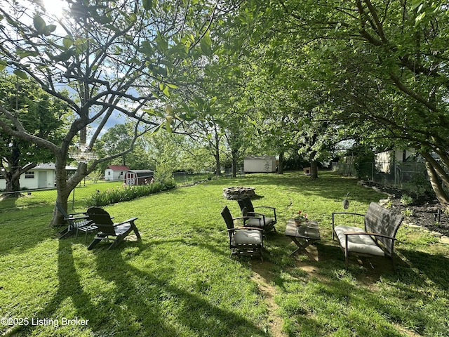 4021/2 Ripy St, Lawrenceburg, KY 40342 - fenced yard featuring a shed and a fire pit