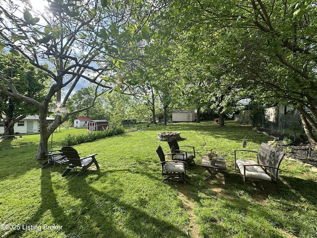 4021/2 Ripy St, Lawrenceburg, KY 40342 - fenced backyard with a storage unit and an outdoor fire pit