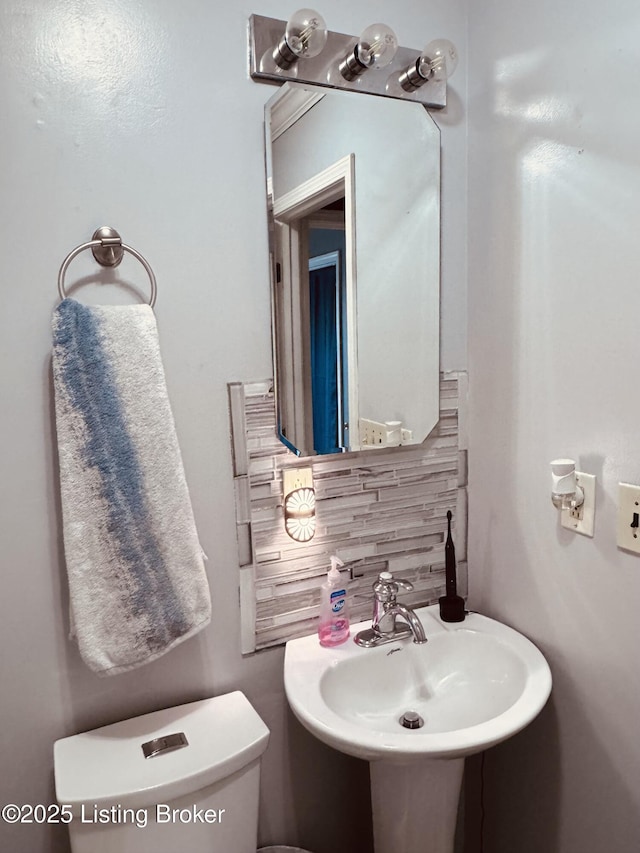 4021/2 Ripy St, Lawrenceburg, KY 40342 - half bath featuring decorative backsplash and toilet
