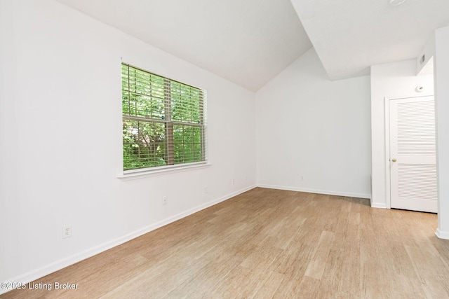 13404 Prospect Glen Way, Prospect, KY 40059 - spare room with wood finished floors and lofted ceiling