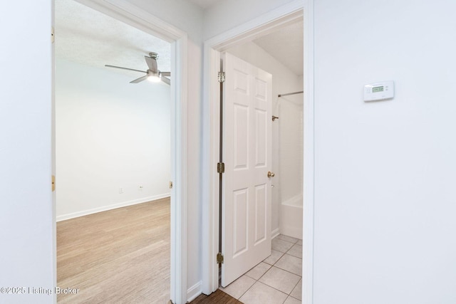 13404 Prospect Glen Way, Prospect, KY 40059 - corridor featuring light tile patterned floors and baseboards