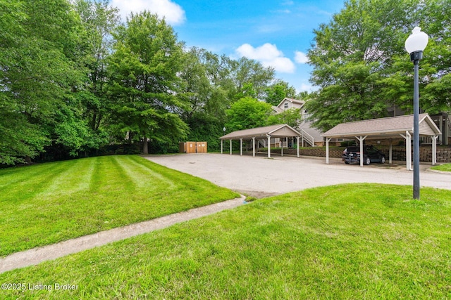 13404 Prospect Glen Way, Prospect, KY 40059 - surrounding community with a detached carport, a yard, and driveway