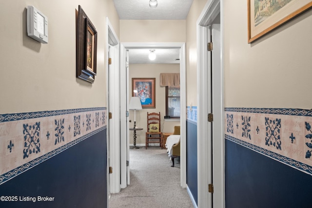710 Victoria Ct, New Albany, IN 47150 - corridor featuring light colored carpet and a textured ceiling