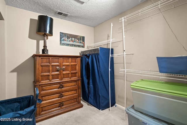 710 Victoria Ct, New Albany, IN 47150 - miscellaneous room with carpet and a textured ceiling