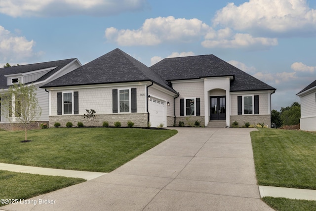 1605 Meremont Ridge Rd, Louisville, KY 40245 - view of front facade with french doors, stone siding, concrete driveway, and a garage