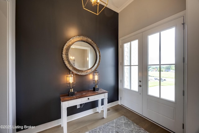 1605 Meremont Ridge Rd, Louisville, KY 40245 - foyer with a chandelier, wood finished floors, and ornamental molding