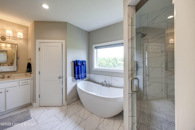 1605 Meremont Ridge Rd, Louisville, KY 40245 - full bathroom featuring vanity, a marble finish shower, marble finish floors, a freestanding tub, and recessed lighting