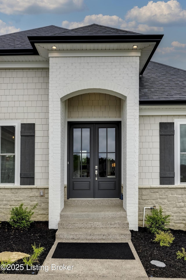 1605 Meremont Ridge Rd, Louisville, KY 40245 - view of exterior entry featuring french doors and a shingled roof