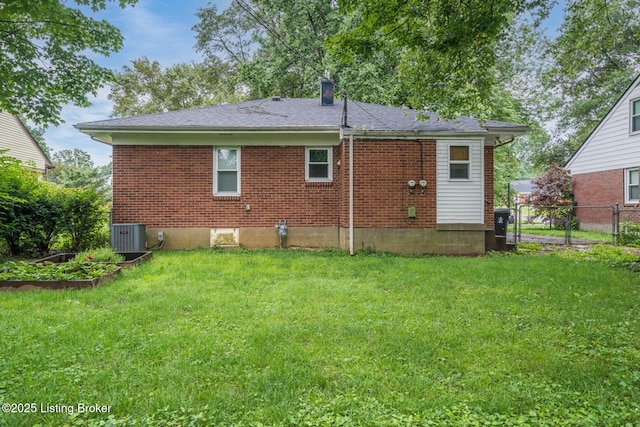 4229 Hillbrook Dr, Louisville, KY 40220 - rear view of house featuring brick siding and a chimney