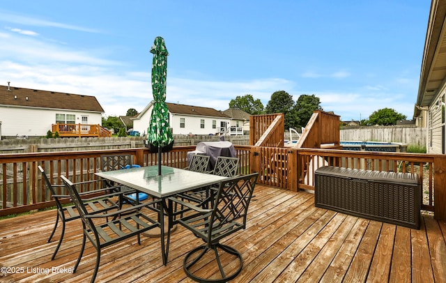 120 Spring Leaf Ct, Shelbyville, KY 40065 - wooden terrace featuring outdoor dining space, a fenced backyard, and area for grilling