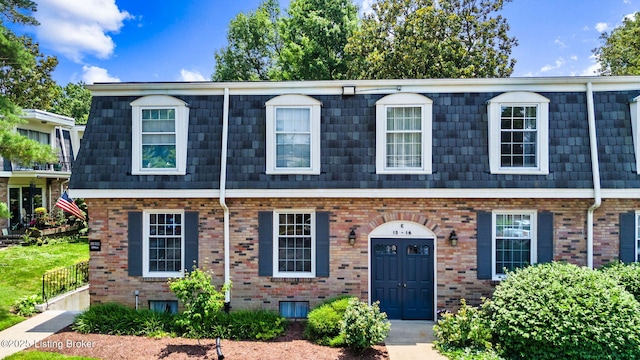 521 Zorn Ave Unit E15, Louisville, KY 40206 - townhome / multi-family property featuring mansard roof and brick siding