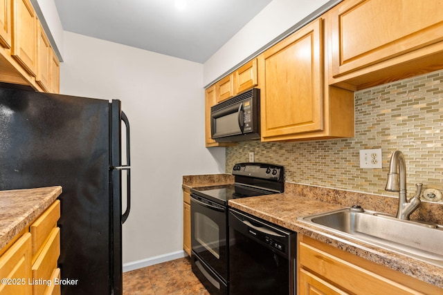 521 Zorn Ave Unit E15, Louisville, KY 40206 - kitchen featuring black appliances, tasteful backsplash, light brown cabinetry, and light countertops