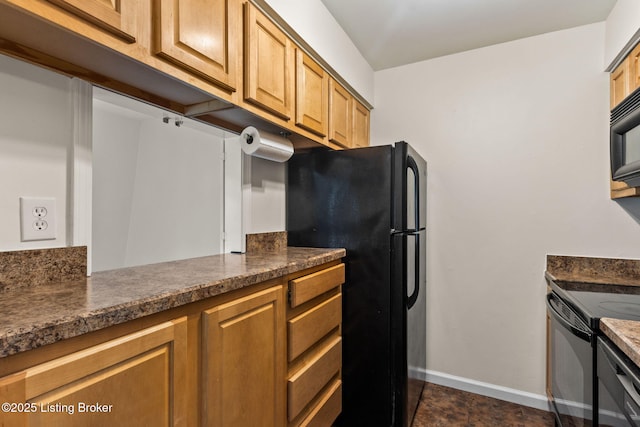 521 Zorn Ave Unit E15, Louisville, KY 40206 - kitchen with black appliances and dark countertops
