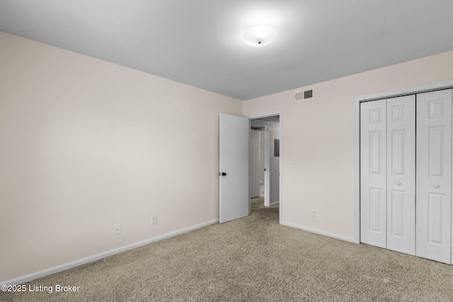 521 Zorn Ave Unit E15, Louisville, KY 40206 - unfurnished bedroom featuring carpet flooring and a closet