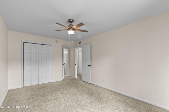 521 Zorn Ave Unit E15, Louisville, KY 40206 - unfurnished bedroom featuring carpet, a closet, and ceiling fan
