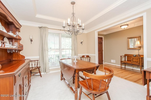 13811 Forest Bend Cir, Louisville, KY 40245 - dining room featuring a chandelier, crown molding, and a raised ceiling