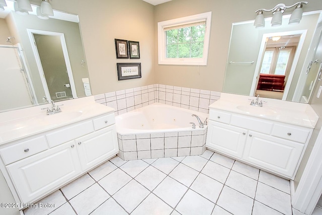 13811 Forest Bend Cir, Louisville, KY 40245 - bathroom featuring two vanities, a whirlpool tub, and tile patterned floors