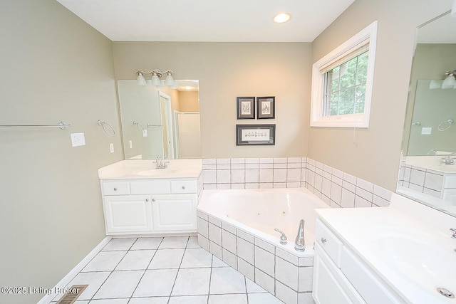 13811 Forest Bend Cir, Louisville, KY 40245 - full bathroom featuring two vanities, a jetted tub, tile patterned flooring, and a stall shower