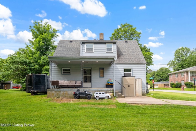 523 Fenley Ave, Louisville, KY 40222 - back of property featuring a yard, a chimney, and a shingled roof