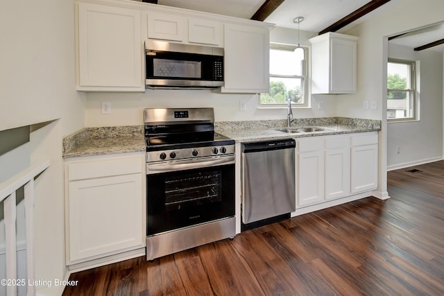 9313 Plumwood Pl, Crestwood, KY 40014 - kitchen featuring stainless steel appliances, dark wood finished floors, white cabinetry, and healthy amount of natural light