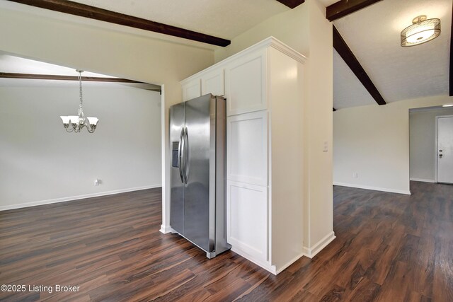 9313 Plumwood Pl, Crestwood, KY 40014 - kitchen with stainless steel fridge, a chandelier, white cabinets, and dark wood-type flooring
