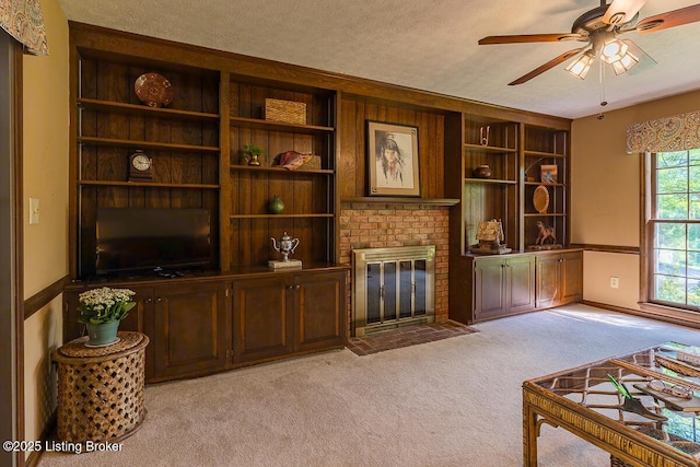 1824 Knollwood Rd, Louisville, KY 40207 - living room with light carpet, a ceiling fan, a brick fireplace, and a textured ceiling