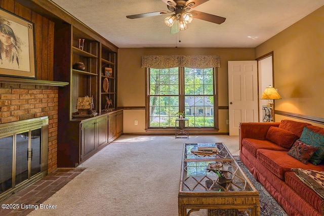 1824 Knollwood Rd, Louisville, KY 40207 - living area featuring carpet flooring, a ceiling fan, and a brick fireplace