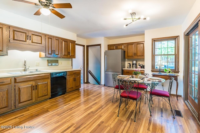 1824 Knollwood Rd, Louisville, KY 40207 - kitchen with freestanding refrigerator, dishwasher, and light countertops